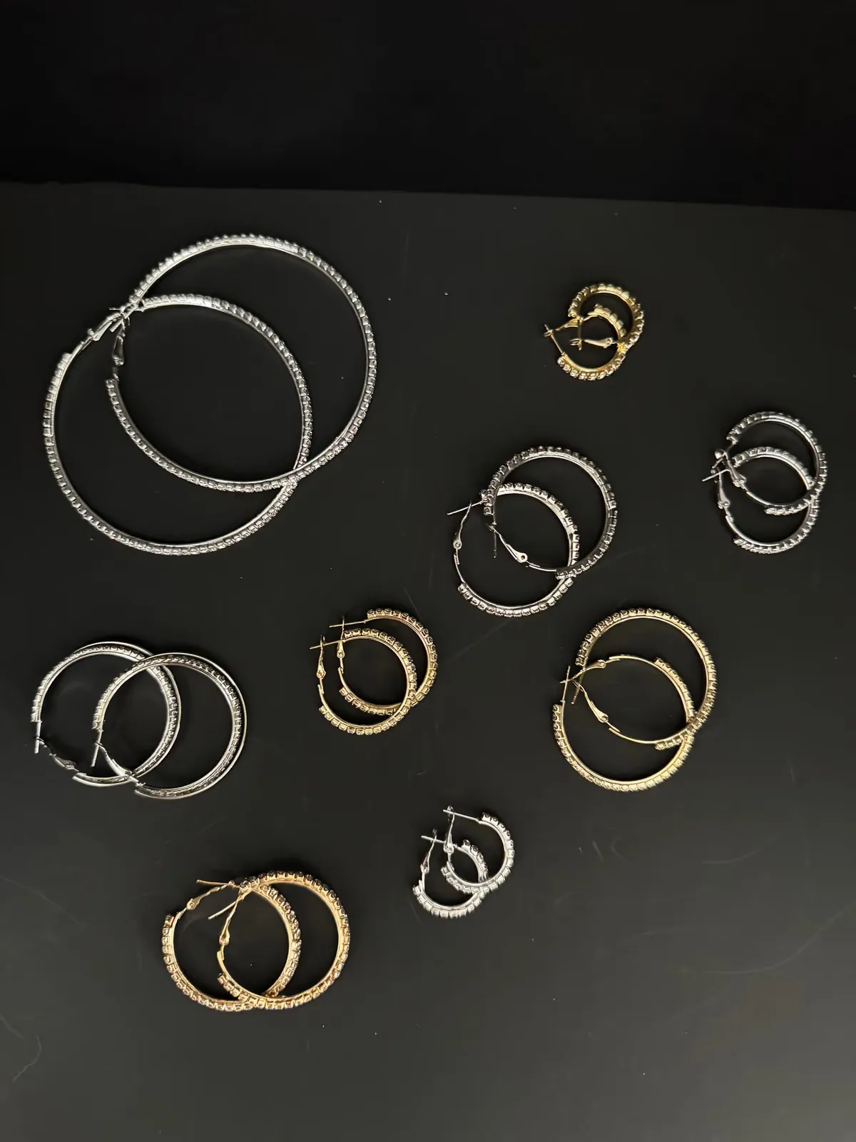 Assorted gold and silver hoop earrings