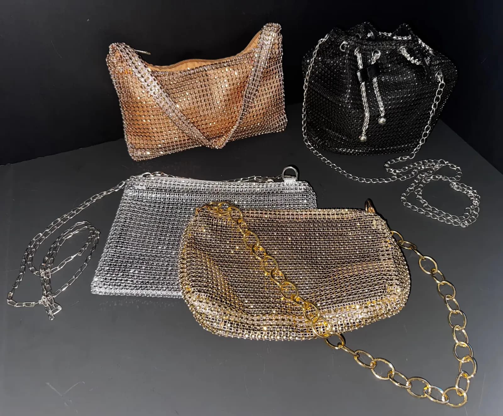 Gold and silver chainmail money bags from a Boudoir Boxes machine